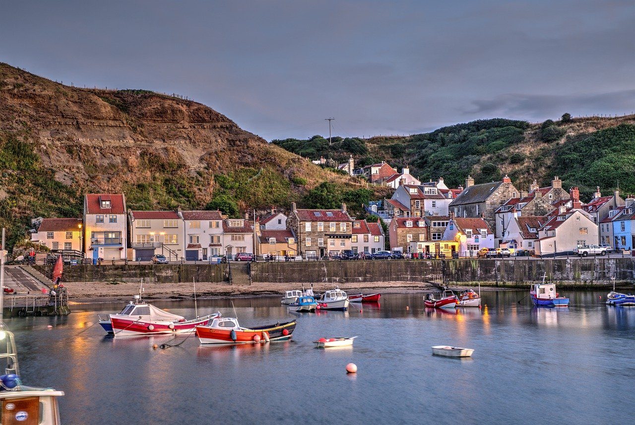 Staithes, Village, North yorkshire | a body of water with boats in it